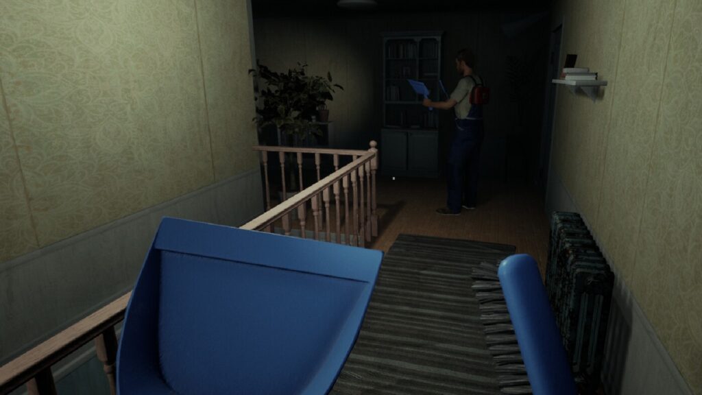 A screenshot of a player holding a Dust Bin in Paranormal Cleanup, a multiplayer horror game that has players cleaning up haunted houses.